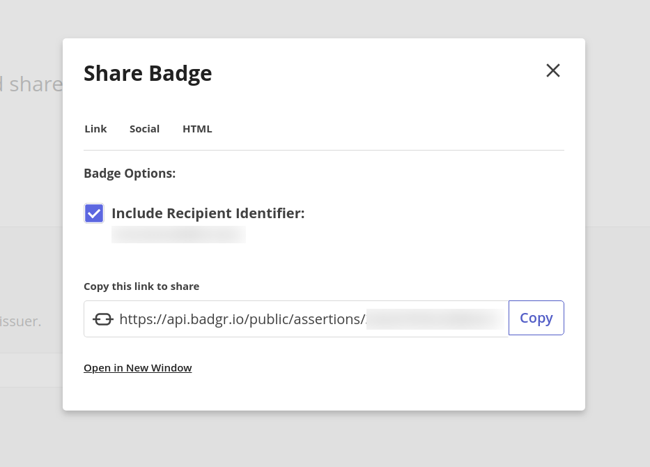 The Share Badge dialog gives the option to include the recipient's identifier information.